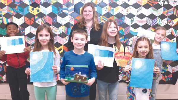 Elementary art students display their artwork.