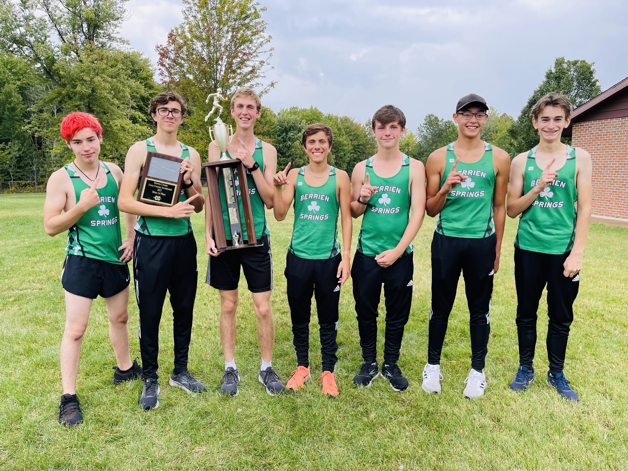 Boys Cross Country Team with Berrien County Meet trophy.