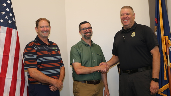 Steve Shunkwiler was congratulated by Board President Paul Toliver and Superintendent Dr. Thomas Bruce.