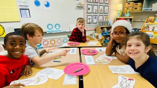 Mars Elementary student enjoy their holiday craft project.