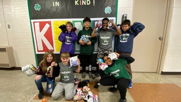 5th Grade Kindness Crew showcase collected socks.