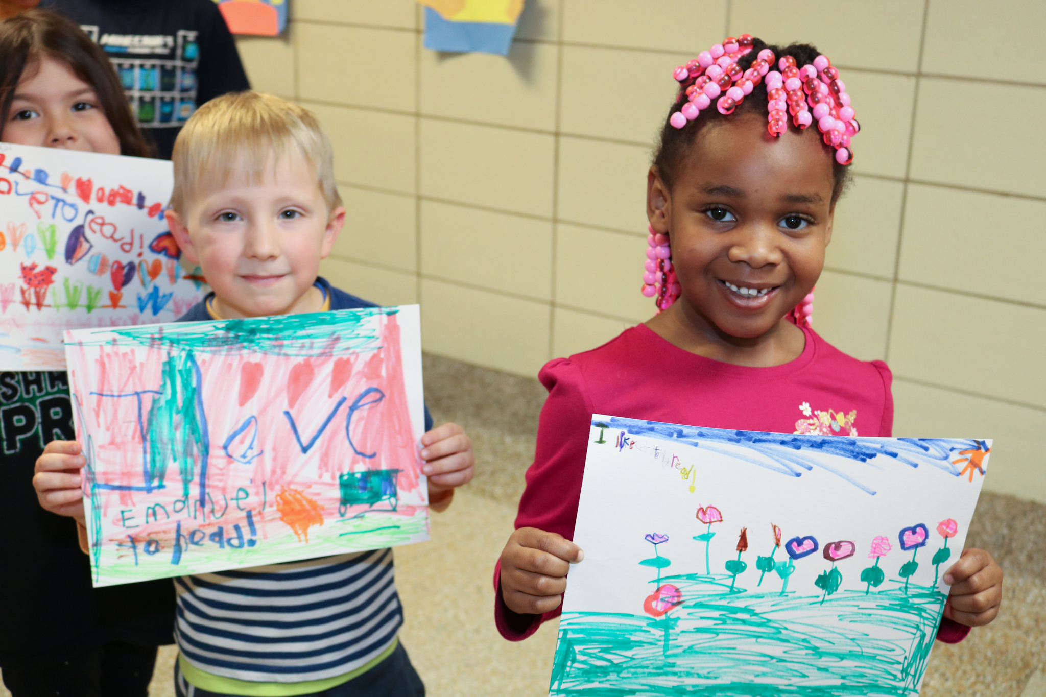 Mars Elementary Students display posters for March Reading Month