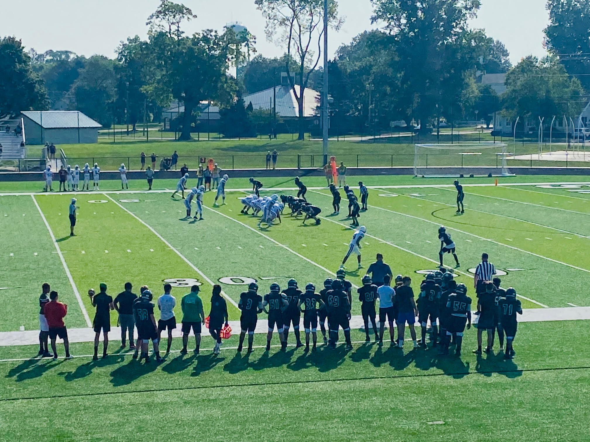 JV Football Playing on Field